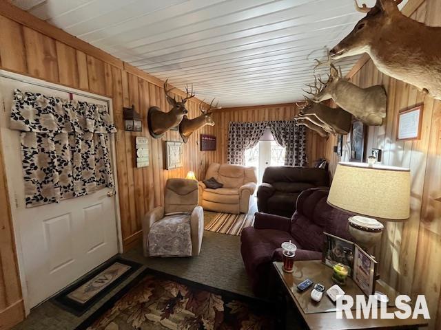 188 W Honeysuckle Dr, Elizabethtown, IL 62931 - living area with wood walls