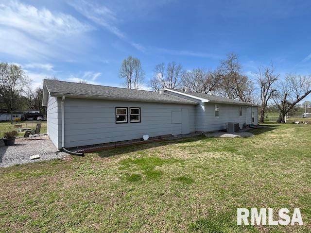 188 W Honeysuckle Dr, Elizabethtown, IL 62931 - rear view of house featuring cooling unit and a yard