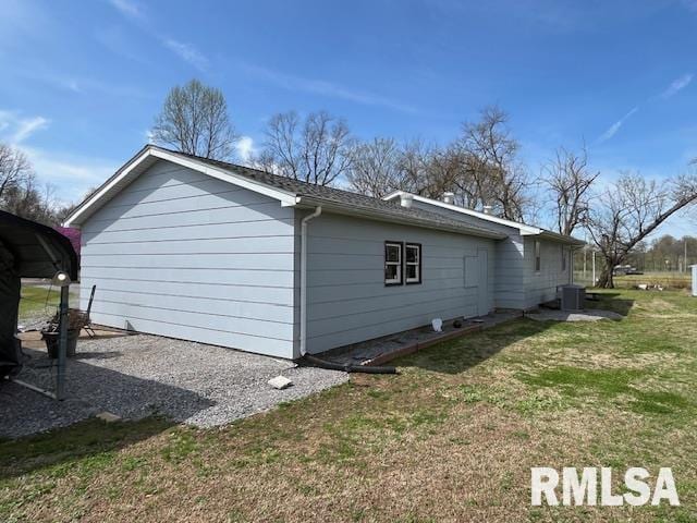 188 W Honeysuckle Dr, Elizabethtown, IL 62931 - view of side of property with central AC and a yard