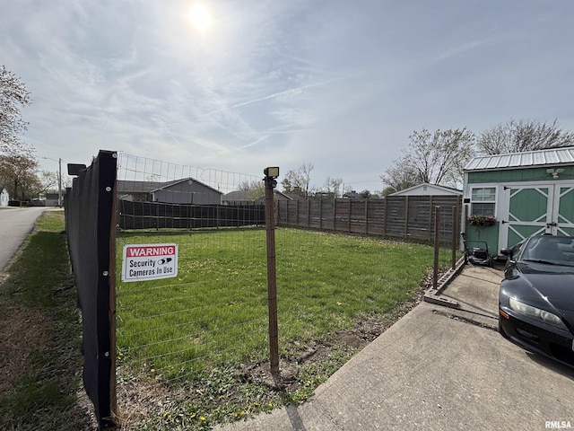 205 N Bentley St, Marion, IL 62959 - view of yard with a shed, an outbuilding, and fence
