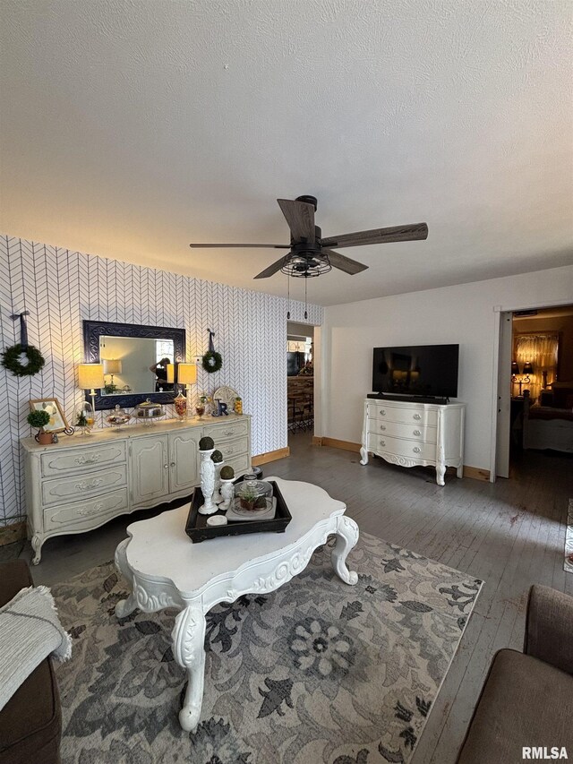 205 N Bentley St, Marion, IL 62959 - bedroom with baseboards, dark wood finished floors, a textured ceiling, wallpapered walls, and a ceiling fan