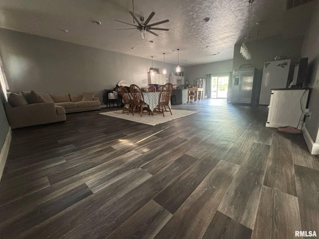 17116 Old Town Dr, Sesser, IL 62884 - living room with dark wood finished floors, a ceiling fan, and visible vents