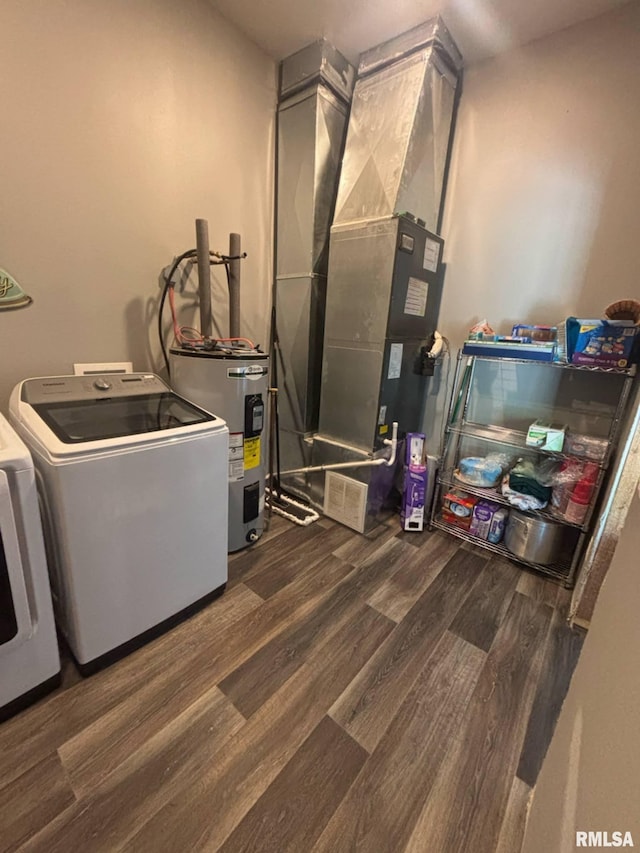 17116 Old Town Dr, Sesser, IL 62884 - clothes washing area with heating unit, laundry area, wood finished floors, washing machine and dryer, and electric water heater