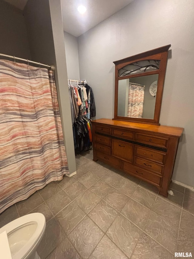 17116 Old Town Dr, Sesser, IL 62884 - full bathroom featuring vanity, toilet, and baseboards