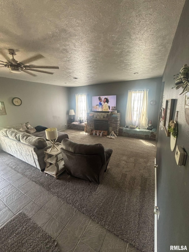 17116 Old Town Dr, Sesser, IL 62884 - living area with a ceiling fan, a textured ceiling, and a fireplace