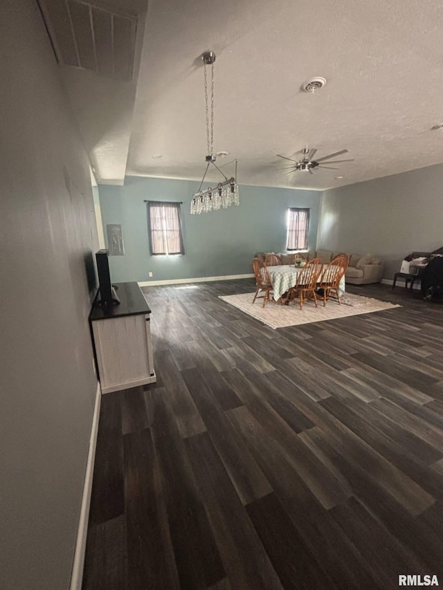 17116 Old Town Dr, Sesser, IL 62884 - dining area with dark wood-style flooring, visible vents, ceiling fan, and a healthy amount of sunlight