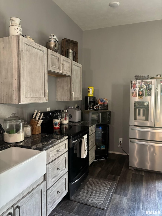 17116 Old Town Dr, Sesser, IL 62884 - kitchen with a sink, black range with electric cooktop, stainless steel fridge with ice dispenser, baseboards, and dark wood-style floors
