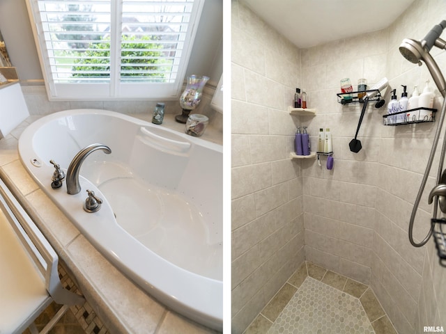full bathroom with a bath and a tile shower