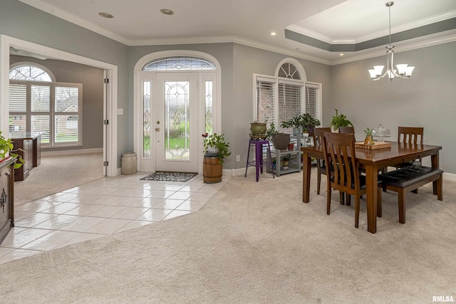 dining area featuring light colored carpet, ornamental molding, recessed lighting, light tile patterned flooring, and a notable chandelier