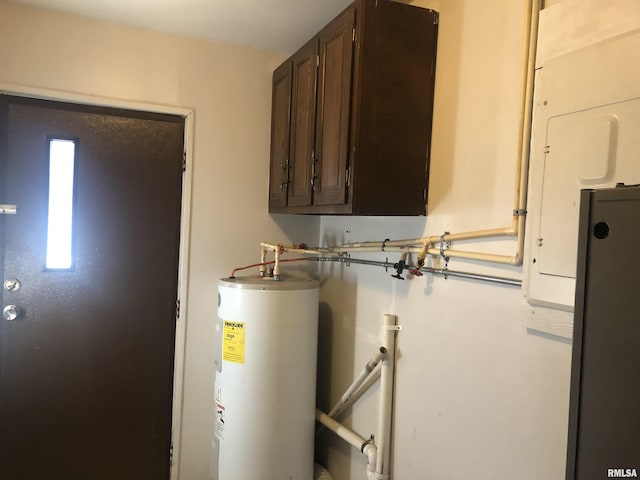 11648 Trolley Line Rd, Marion, IL 62959 - utility room with electric water heater
