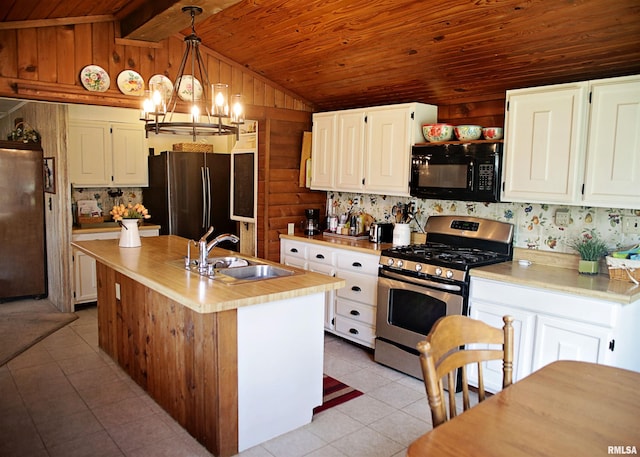 11648 Trolley Line Rd, Marion, IL 62959 - kitchen with light tile patterned floors, lofted ceiling with beams, black appliances, light countertops, and a sink