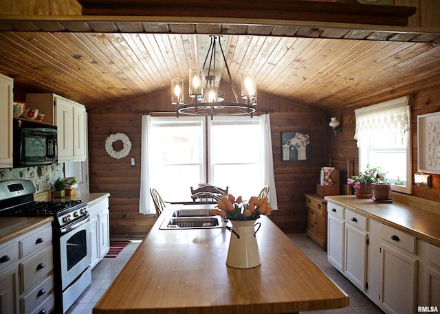 11648 Trolley Line Rd, Marion, IL 62959 - kitchen featuring black microwave, stainless steel gas stove, a sink, and wooden counters