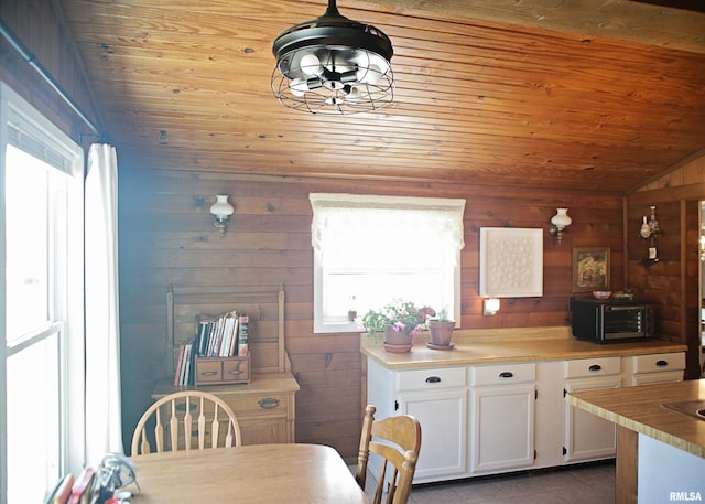 11648 Trolley Line Rd, Marion, IL 62959 - kitchen featuring white cabinets, tile patterned floors, wooden ceiling, and lofted ceiling