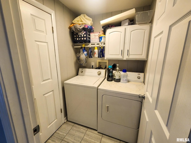 609 S Poplar St, Carbondale, IL 62901 - washroom with washer and clothes dryer and cabinet space