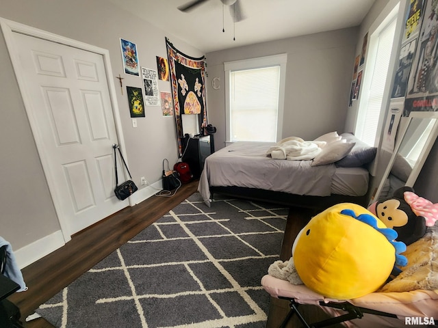 609 S Poplar St, Carbondale, IL 62901 - bedroom with baseboards, a ceiling fan, and wood finished floors