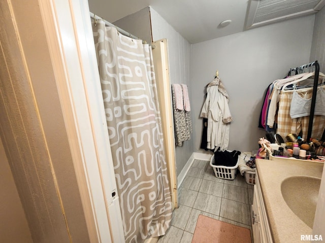 609 S Poplar St, Carbondale, IL 62901 - bathroom with vanity and a shower with curtain