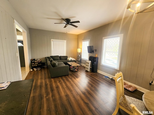 609 S Poplar St, Carbondale, IL 62901 - living room featuring baseboards, a ceiling fan, and wood finished floors