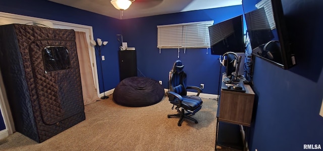 office featuring carpet, baseboards, and ceiling fan