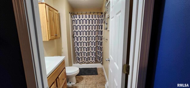 full bathroom with toilet, tile patterned floors, a shower with shower curtain, and vanity