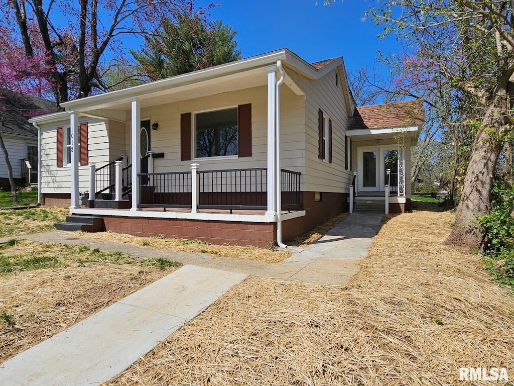 1018 Pace Ave, Mount Vernon, IL 62864 - view of front of home with a shingled roof and covered porch