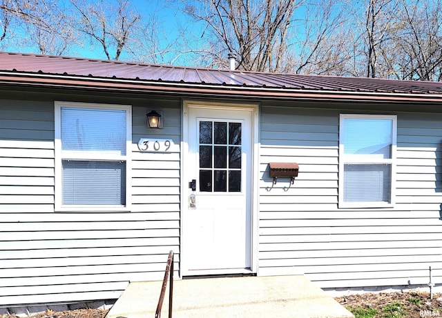 property entrance with metal roof