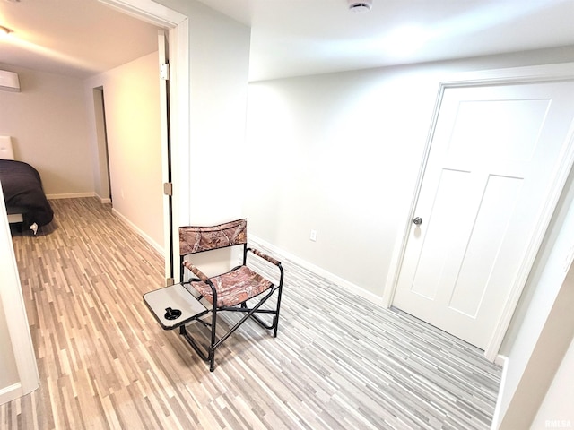309 E Washington St, Flora, IL 62839 - living area featuring light wood-style floors and baseboards