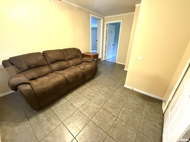 living area featuring crown molding, light tile patterned flooring, and baseboards