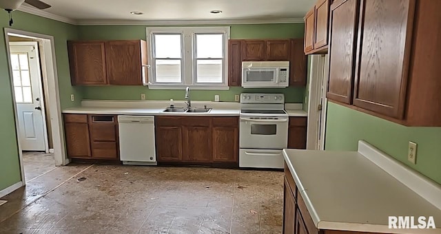 318 W Raymond St, Harrisburg, IL 62946 - kitchen with white appliances, ornamental molding, a ceiling fan, light countertops, and a sink