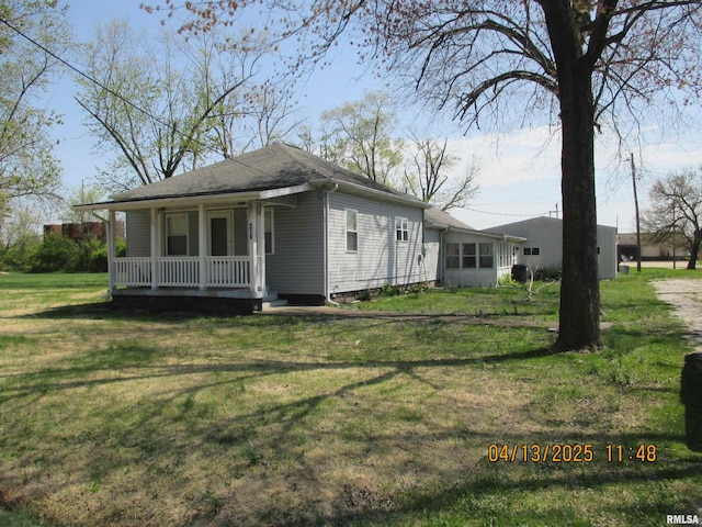 229 S James St, Centralia, IL 62801 - exterior space featuring covered porch and a front lawn