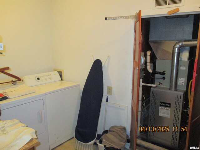 229 S James St, Centralia, IL 62801 - clothes washing area featuring laundry area, separate washer and dryer, and visible vents