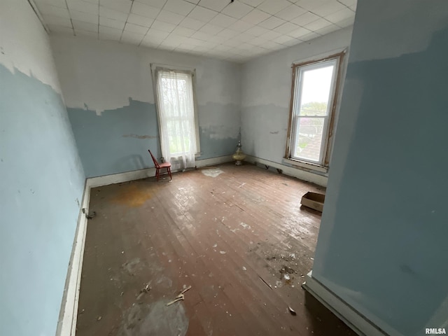 1012 W 9th St, Alton, IL 62002 - spare room featuring wood finished floors