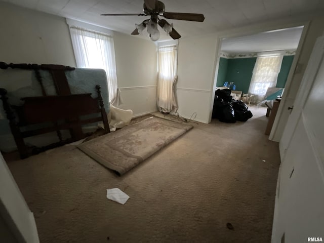 1012 W 9th St, Alton, IL 62002 - bedroom featuring ceiling fan and carpet floors
