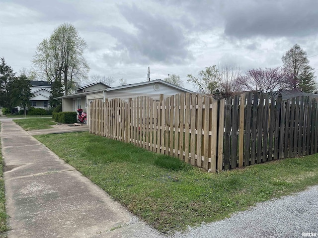 view of gate with fence