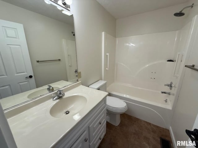 bathroom with toilet, visible vents, vanity, and washtub / shower combination