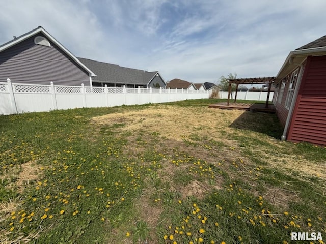 view of yard featuring a pergola and a fenced backyard