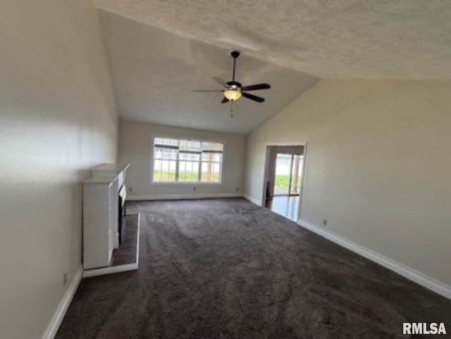 unfurnished living room featuring baseboards, carpet flooring, a textured ceiling, a ceiling fan, and lofted ceiling