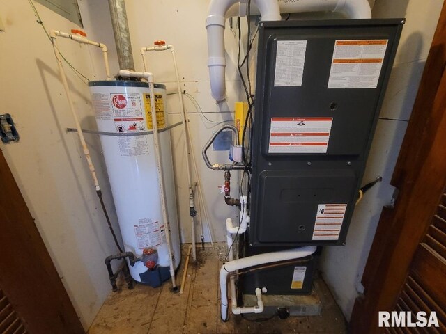 utility room featuring water heater and heating unit