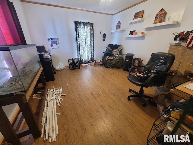office with crown molding and wood finished floors