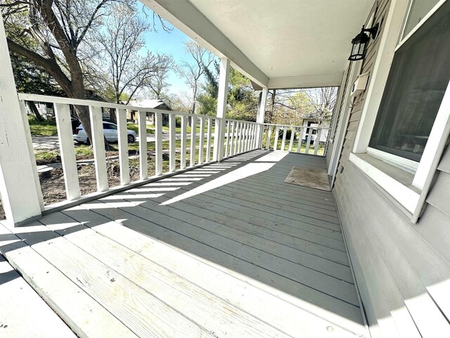 641 N Hickory St, Centralia, IL 62801 - wooden deck featuring covered porch