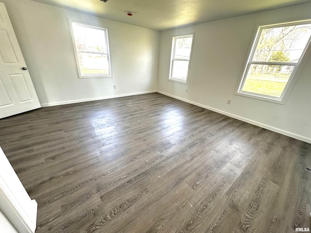 641 N Hickory St, Centralia, IL 62801 - interior space with baseboards and dark wood-type flooring