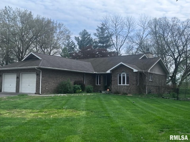 3 Suburban Dr, Murphysboro, IL 62966 - ranch-style house with a chimney, fence, a front lawn, brick siding, and a garage