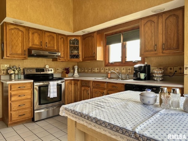 3 Suburban Dr, Murphysboro, IL 62966 - kitchen featuring light countertops, under cabinet range hood, a sink, and electric range