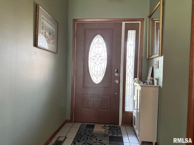 3 Suburban Dr, Murphysboro, IL 62966 - entryway featuring visible vents, baseboards, and light tile patterned floors
