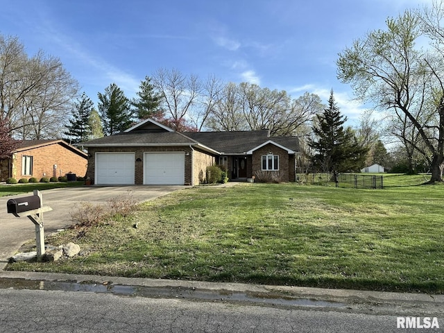 3 Suburban Dr, Murphysboro, IL 62966 - single story home featuring a garage, a front lawn, fence, and concrete driveway