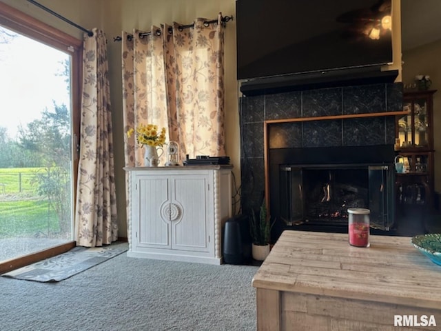3 Suburban Dr, Murphysboro, IL 62966 - carpeted living room featuring a glass covered fireplace