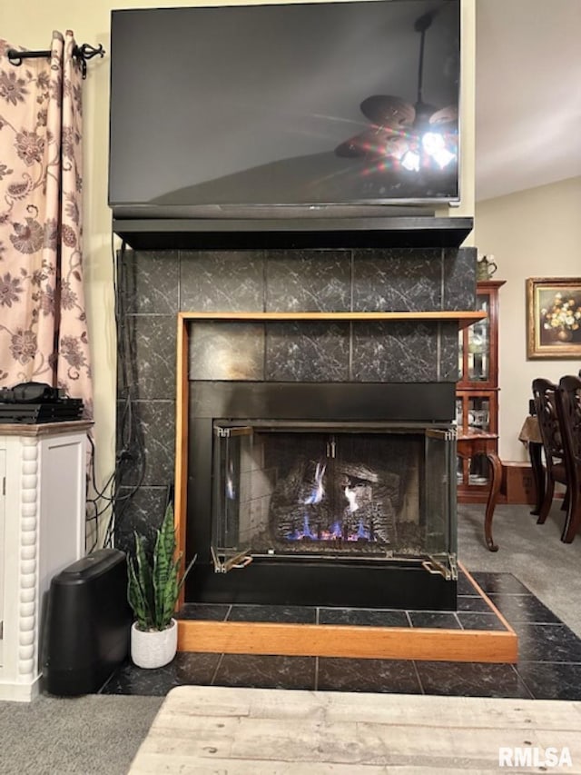 3 Suburban Dr, Murphysboro, IL 62966 - room details featuring carpet flooring and a tiled fireplace