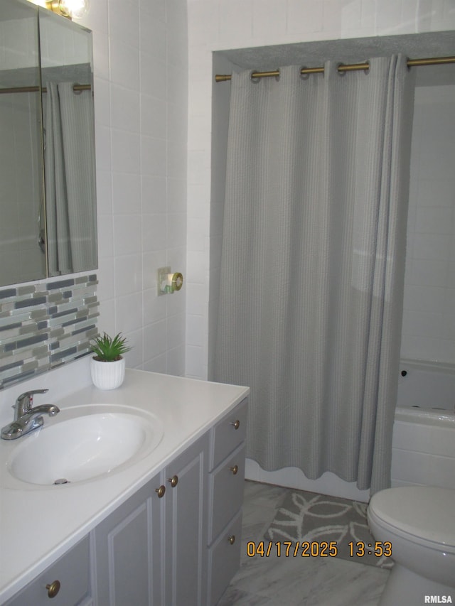 205 Texas St, Carterville, IL 62918 - bathroom with toilet, vanity, and shower / tub combo with curtain