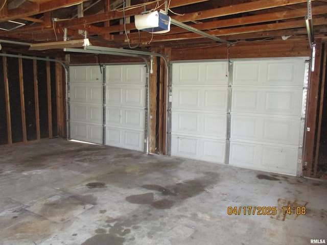 205 Texas St, Carterville, IL 62918 - garage featuring a garage door opener