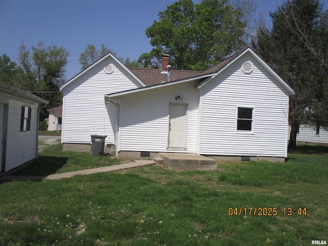 205 Texas St, Carterville, IL 62918 - rear view of house with a lawn and a chimney