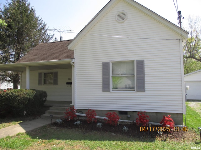 205 Texas St, Carterville, IL 62918 - view of front of house featuring roof with shingles and covered porch